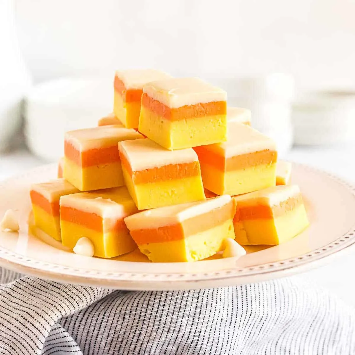 squares of fudge on a white platter