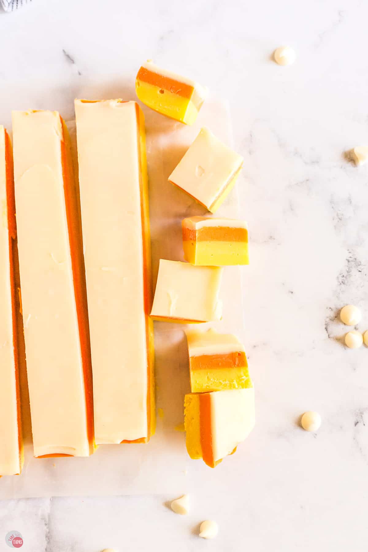 fudge cut into strips on a marble surface