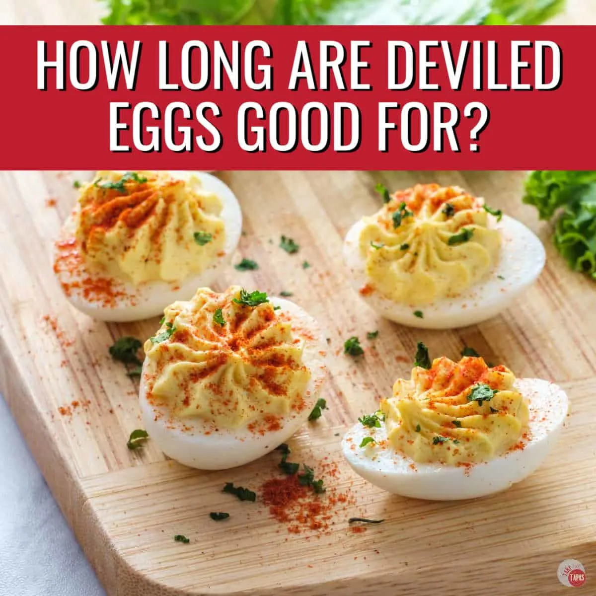 deviled eggs on a wood board with red banner and text