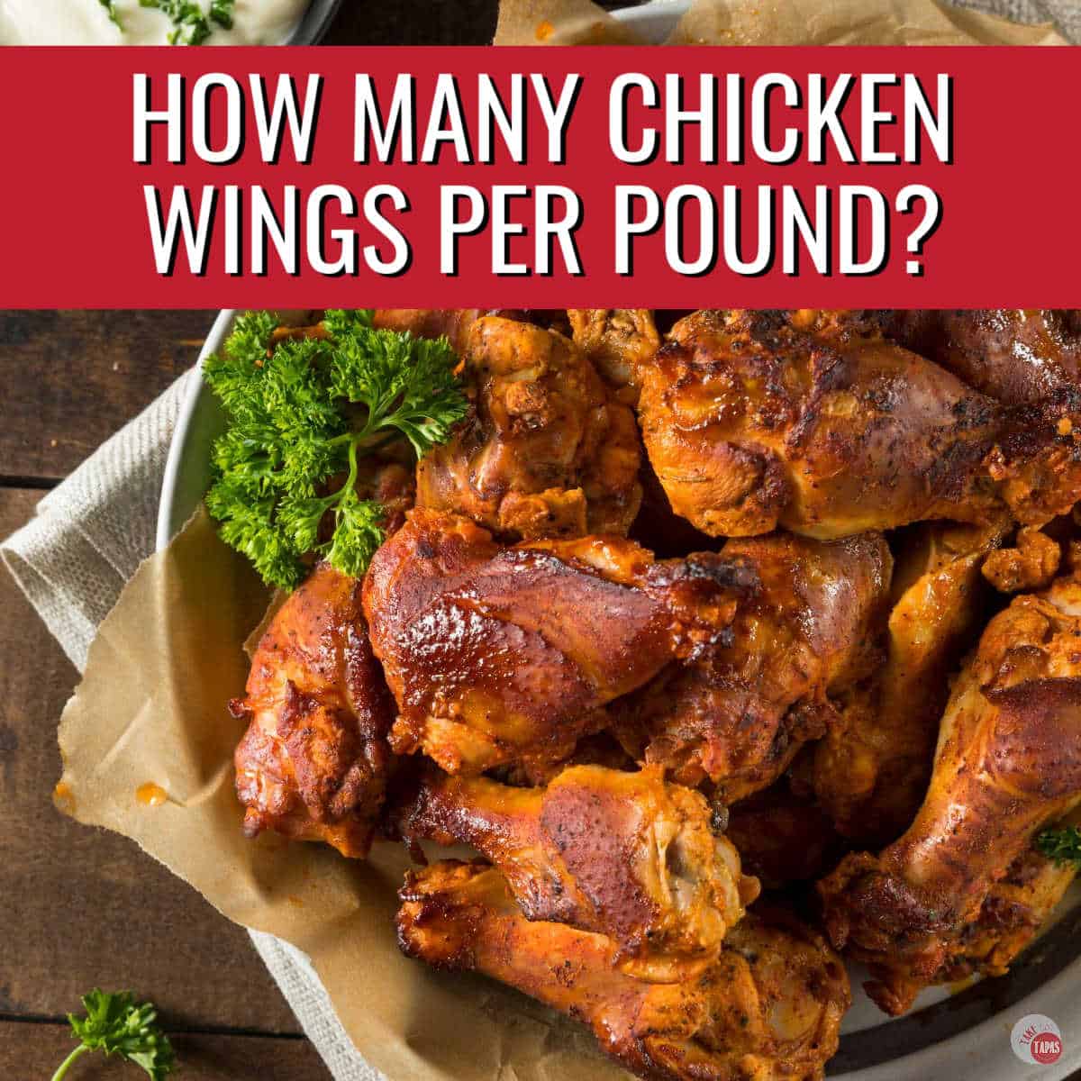 1 pound of chicken wings on a plate with red banner and text