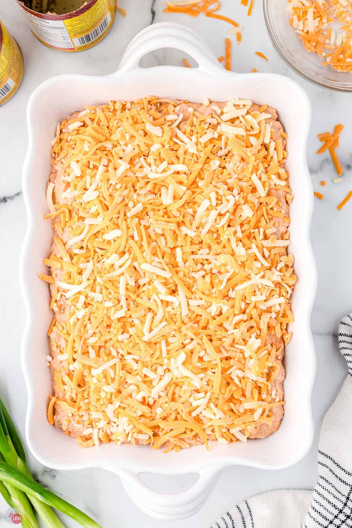 unbaked texas trash dip in a white dish
