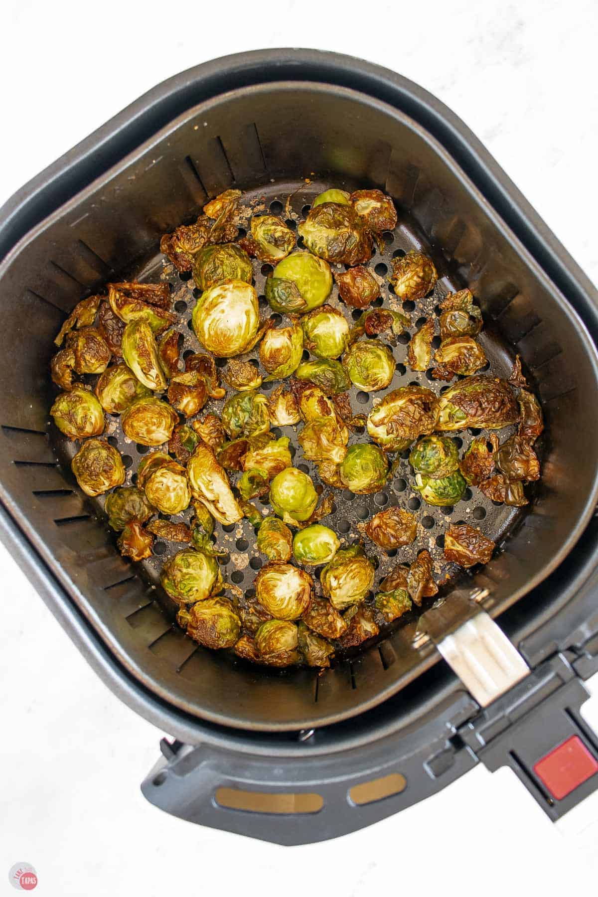 cooked Brussels in an air fryer basket