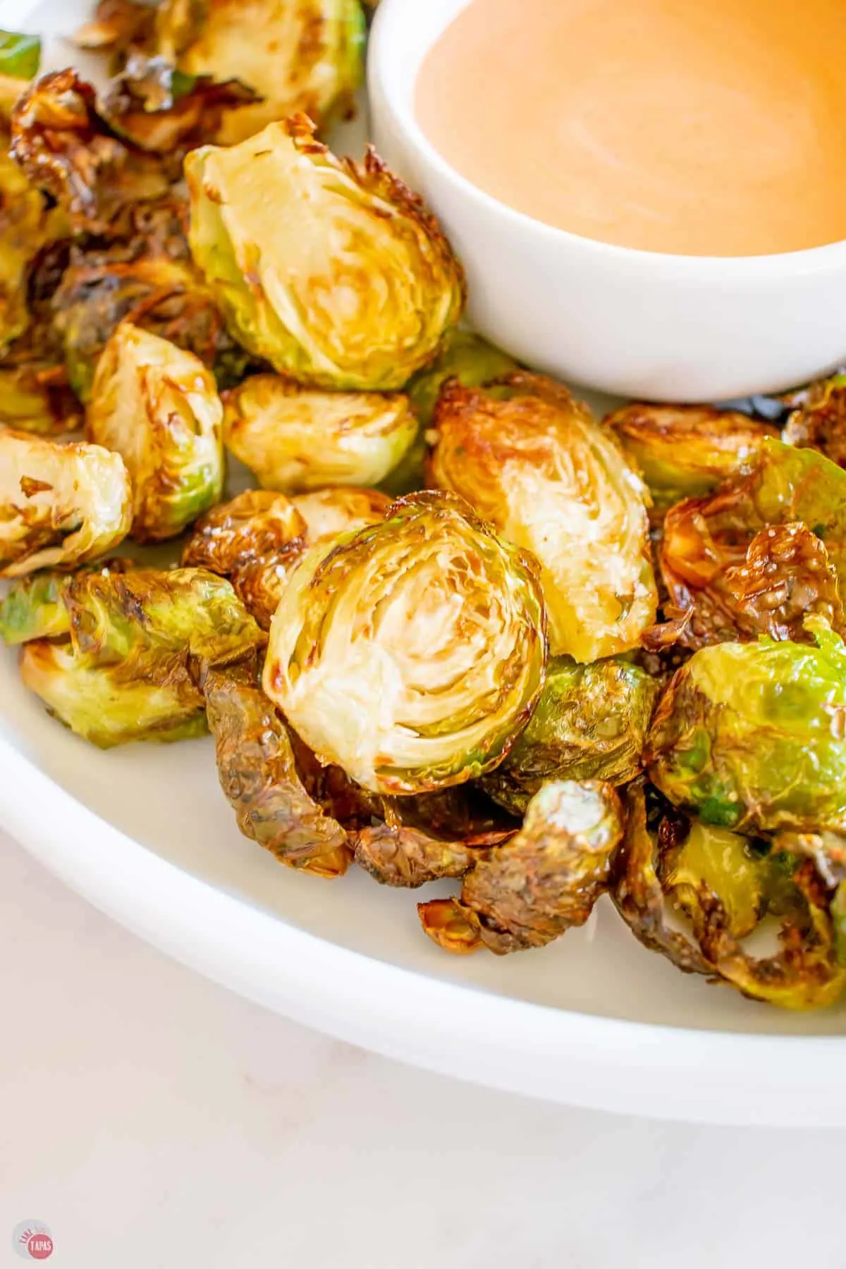 close up of crispy sprouts on a dish