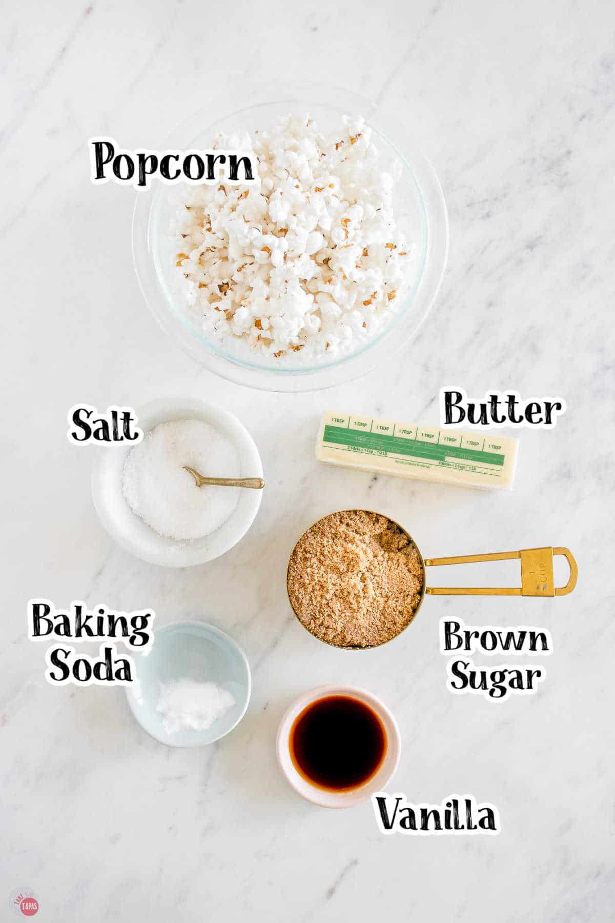 labeled picture of caramel corn ingredients in small bowls