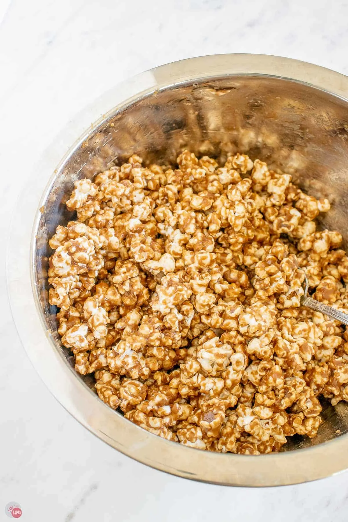 unbaked caramel popcorn in a bowl