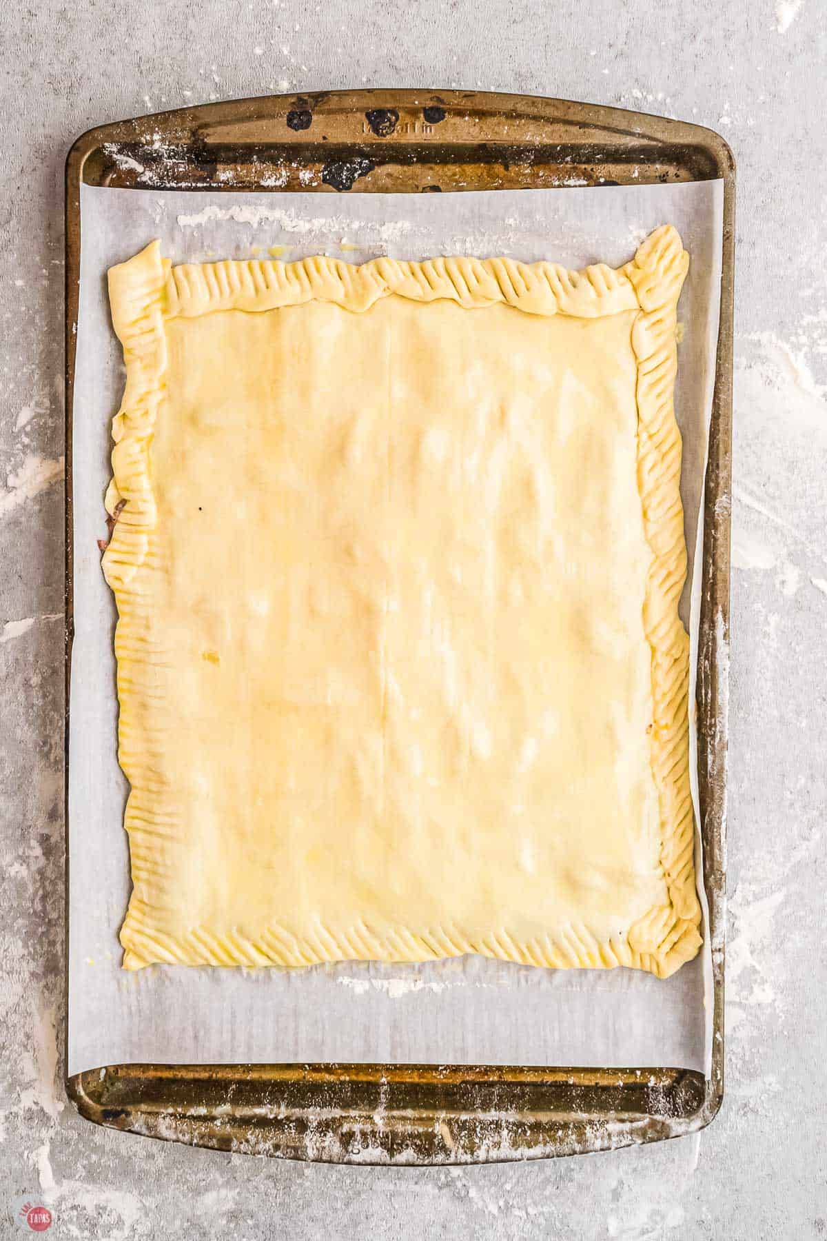puff pastry on a baking sheet covered with egg wash