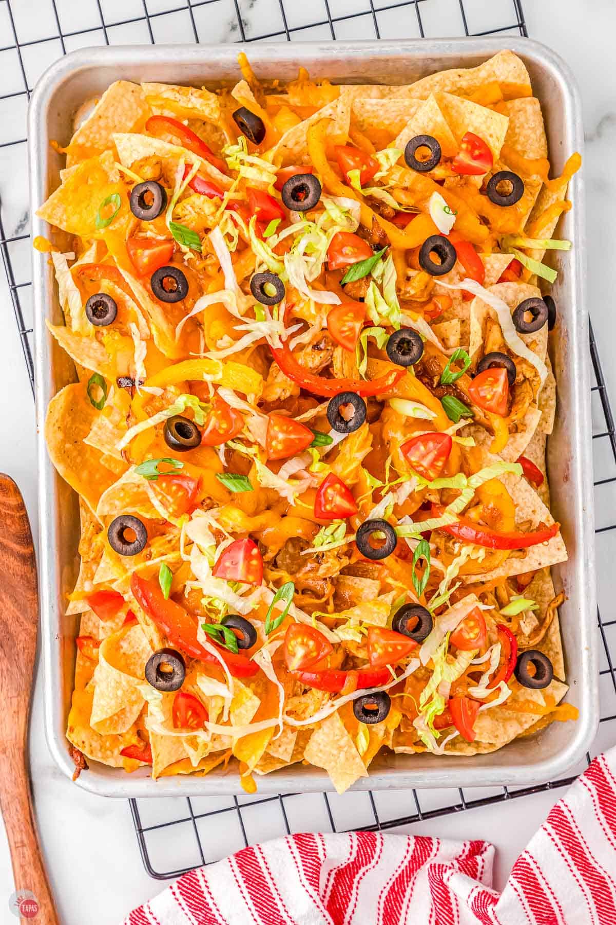 https://www.taketwotapas.com/wp-content/uploads/2022/11/Fajita-Nachos-Take-Two-Tapas-13.jpg