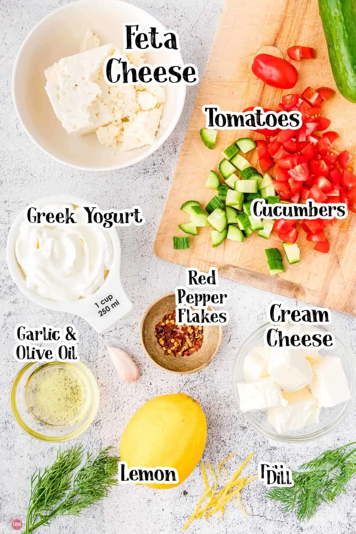 labeled ingredients in bowls on a marble surface