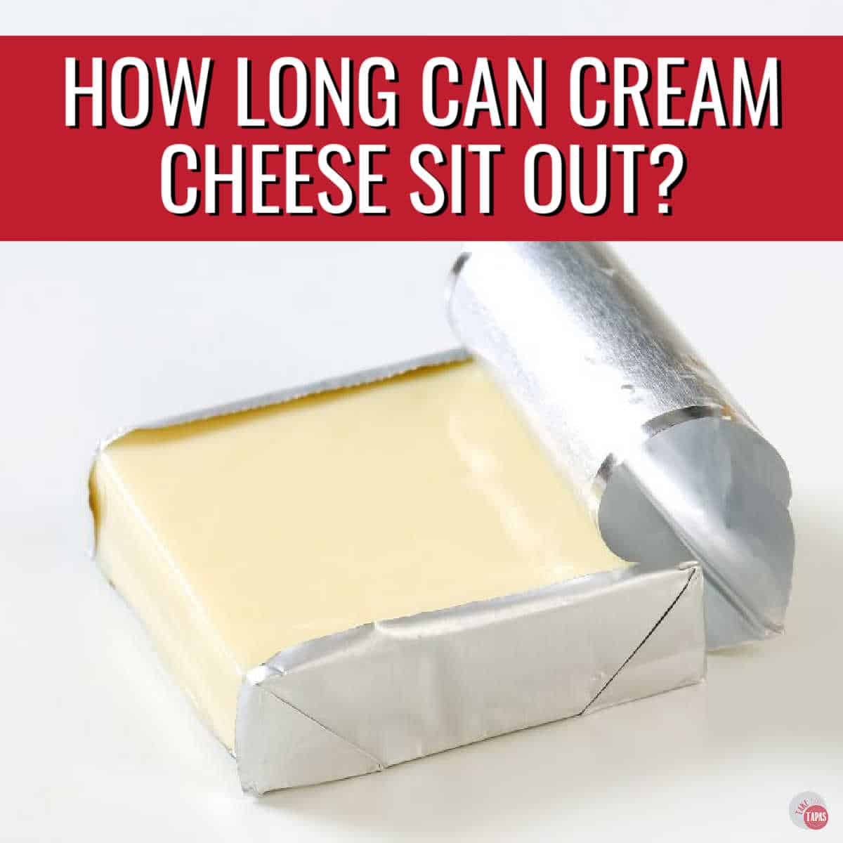 opened block of cream cheese with red banner and text