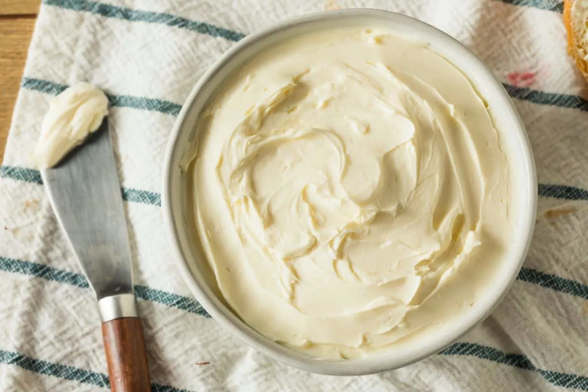 bowl of cream cheese with striped napkin