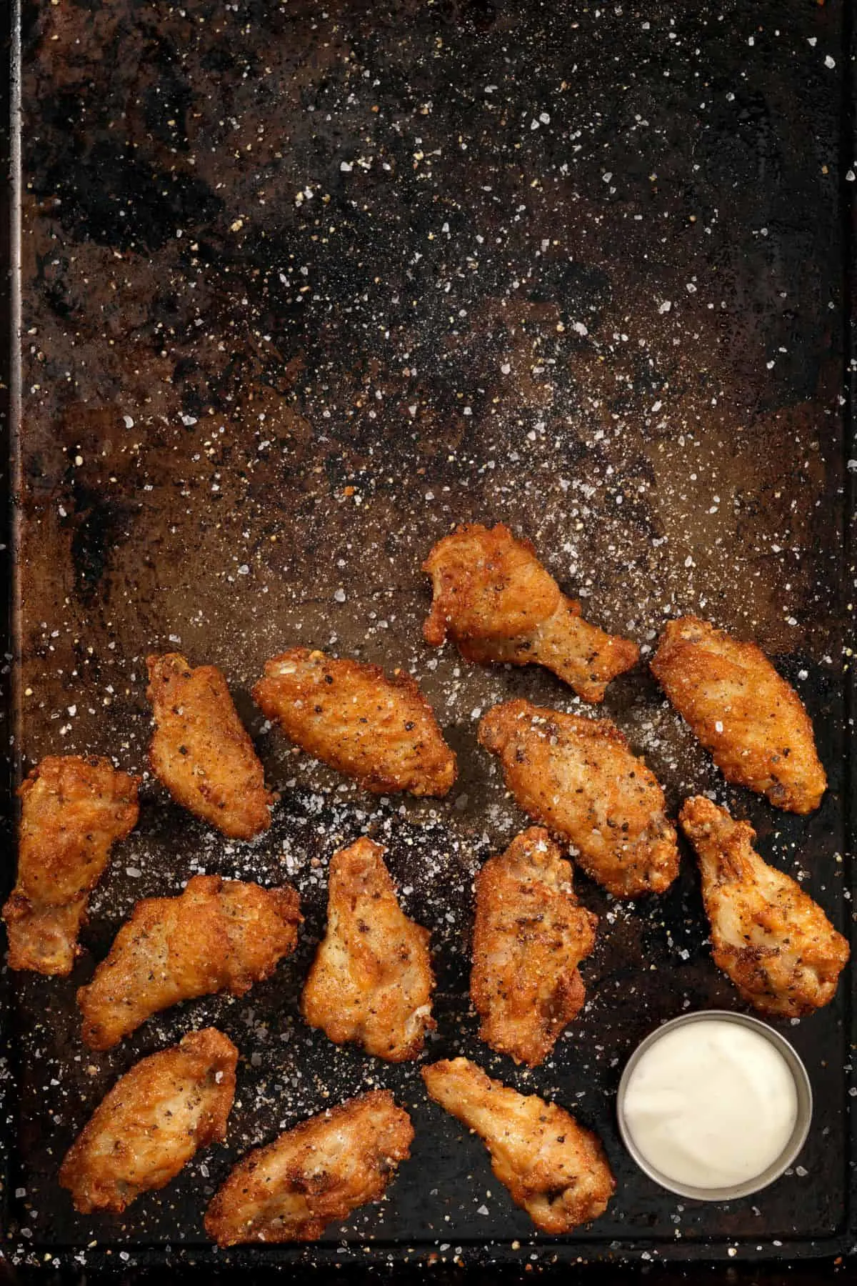 tray of wings sprinkled with salt