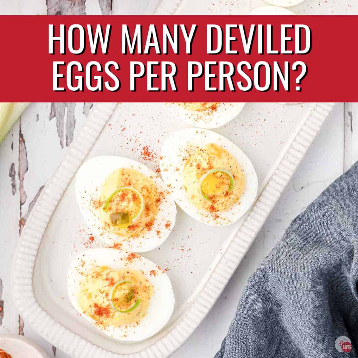 tray of deviled eggs with red banner and white text
