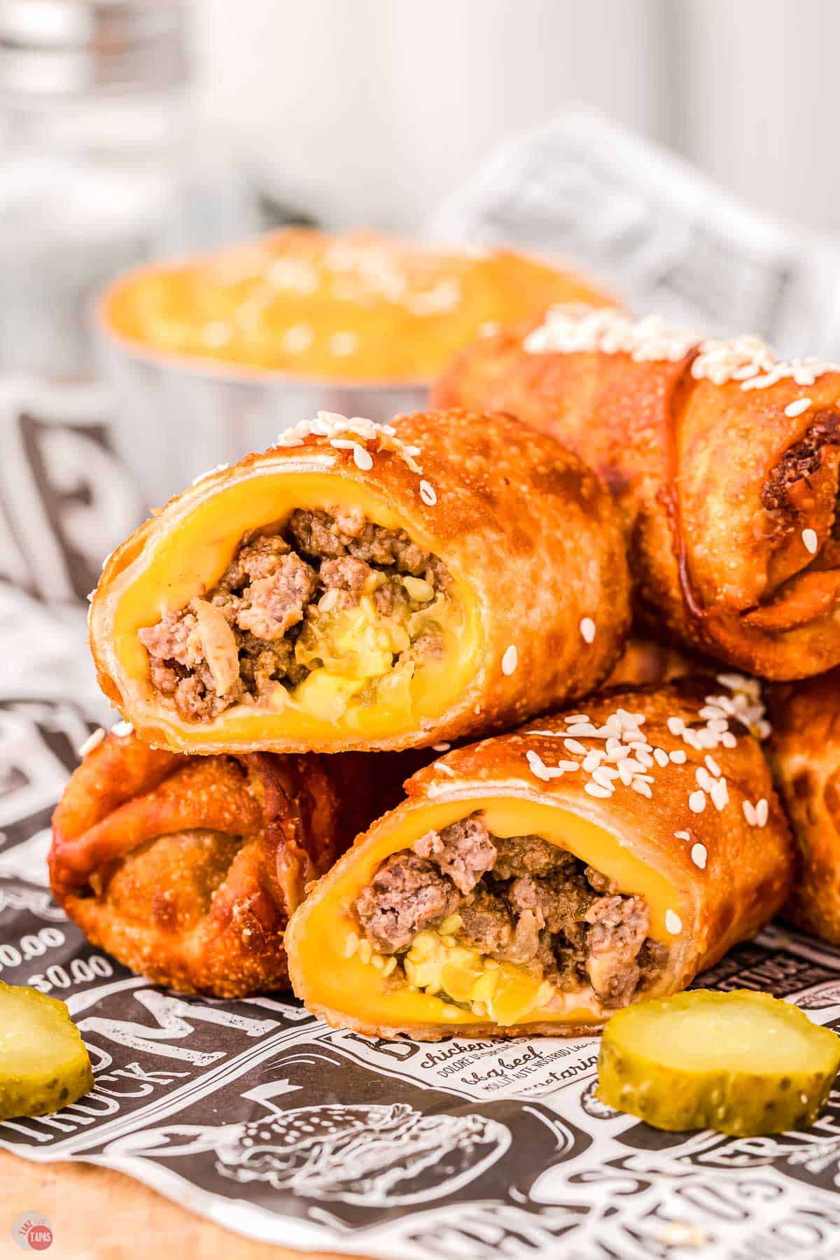 egg rolls cut in half with cheese
