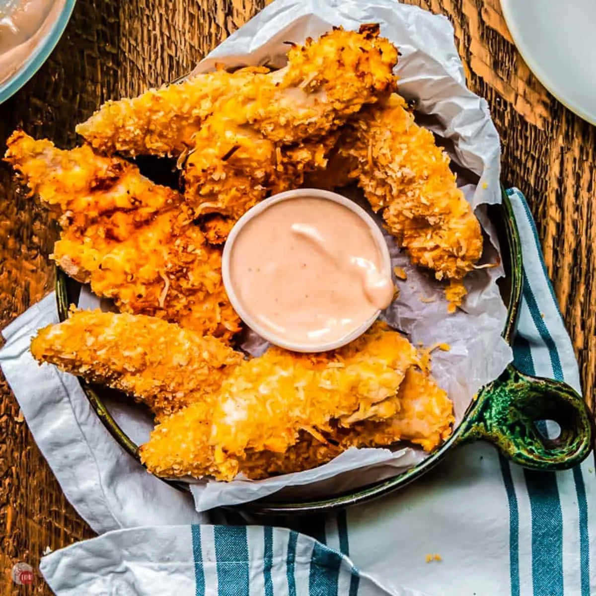 coconut chicken tenders in a plate