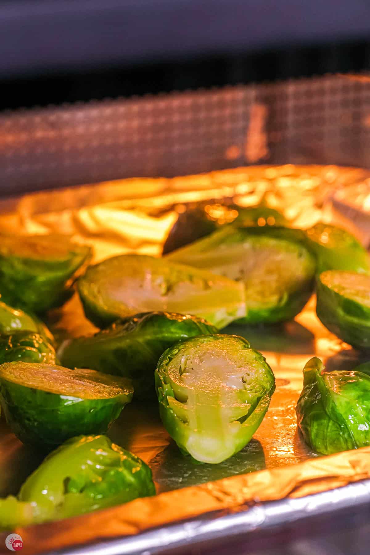 sprouts in an oven on a baking sheet