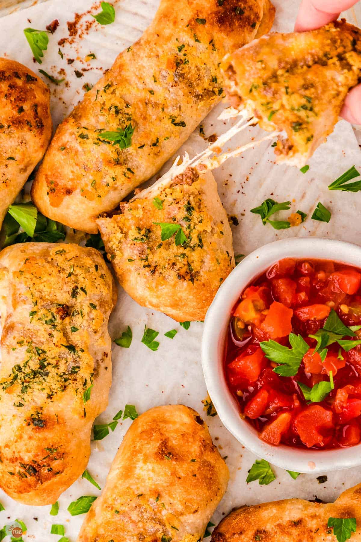 cheesy taco breadsticks on a tray