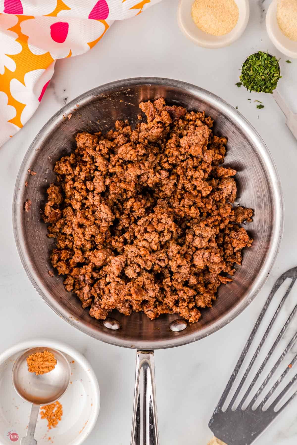 1-pound lean ground beef with spices in a pan