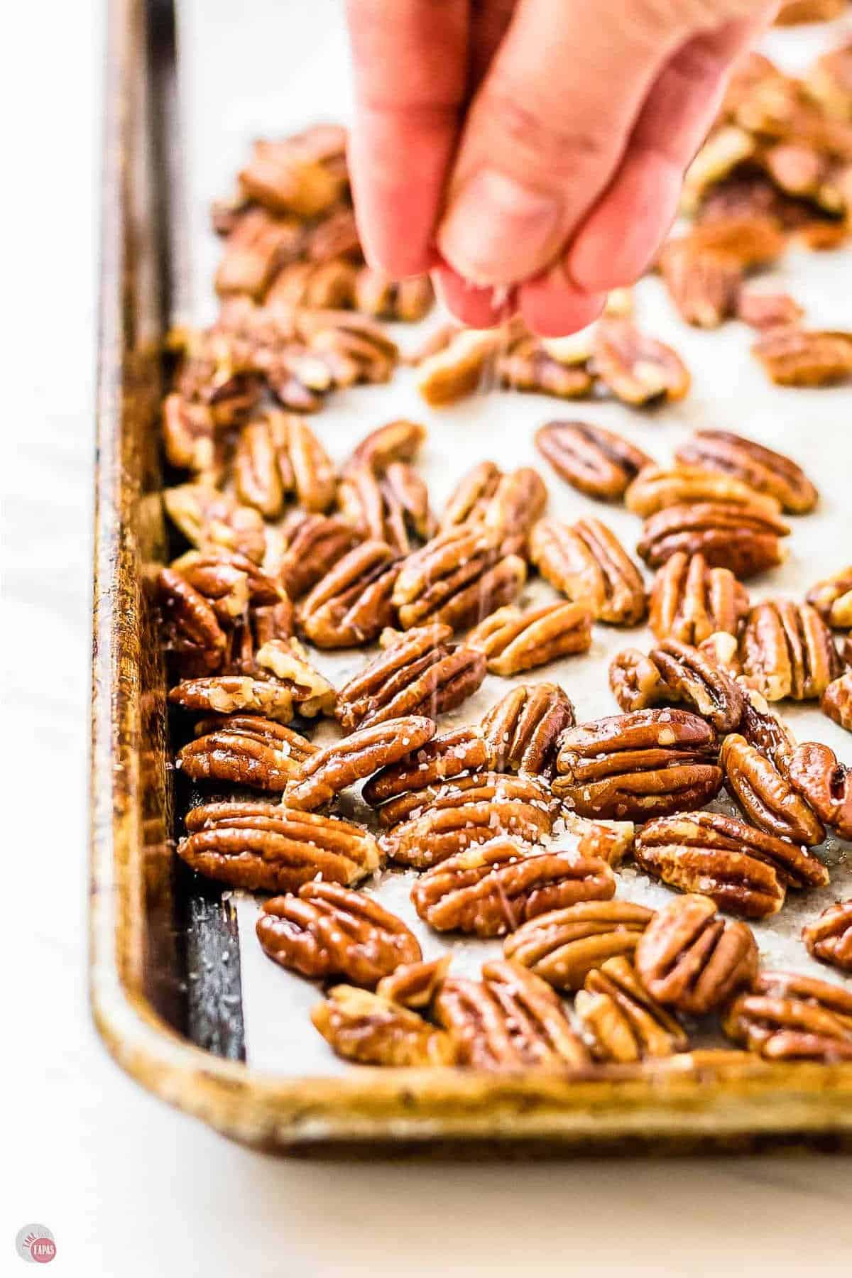 toasted pecans on a baking tray