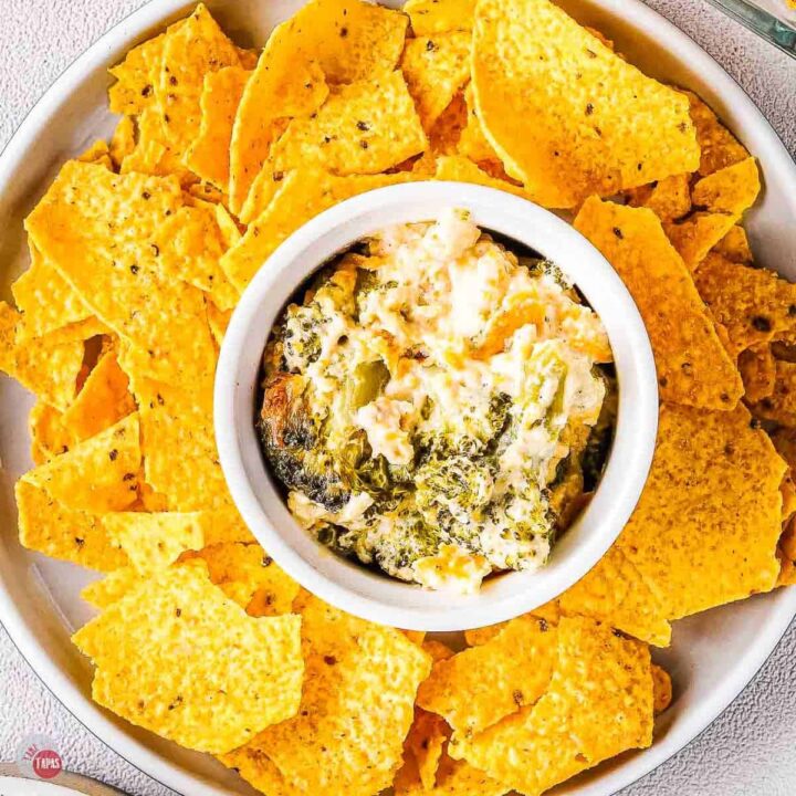 bowl of broccoli dip with tortilla chips