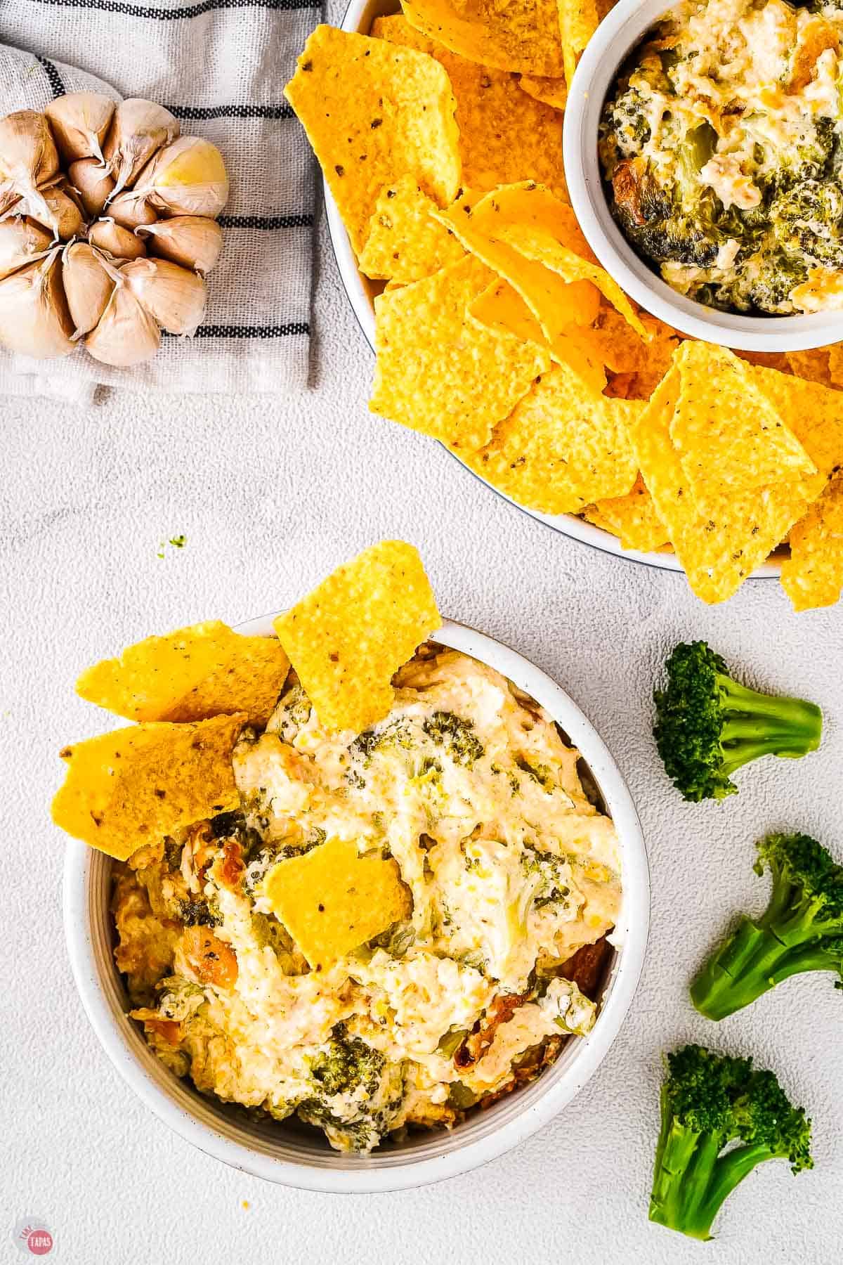 bowl of cheesy dip with fresh vegetables