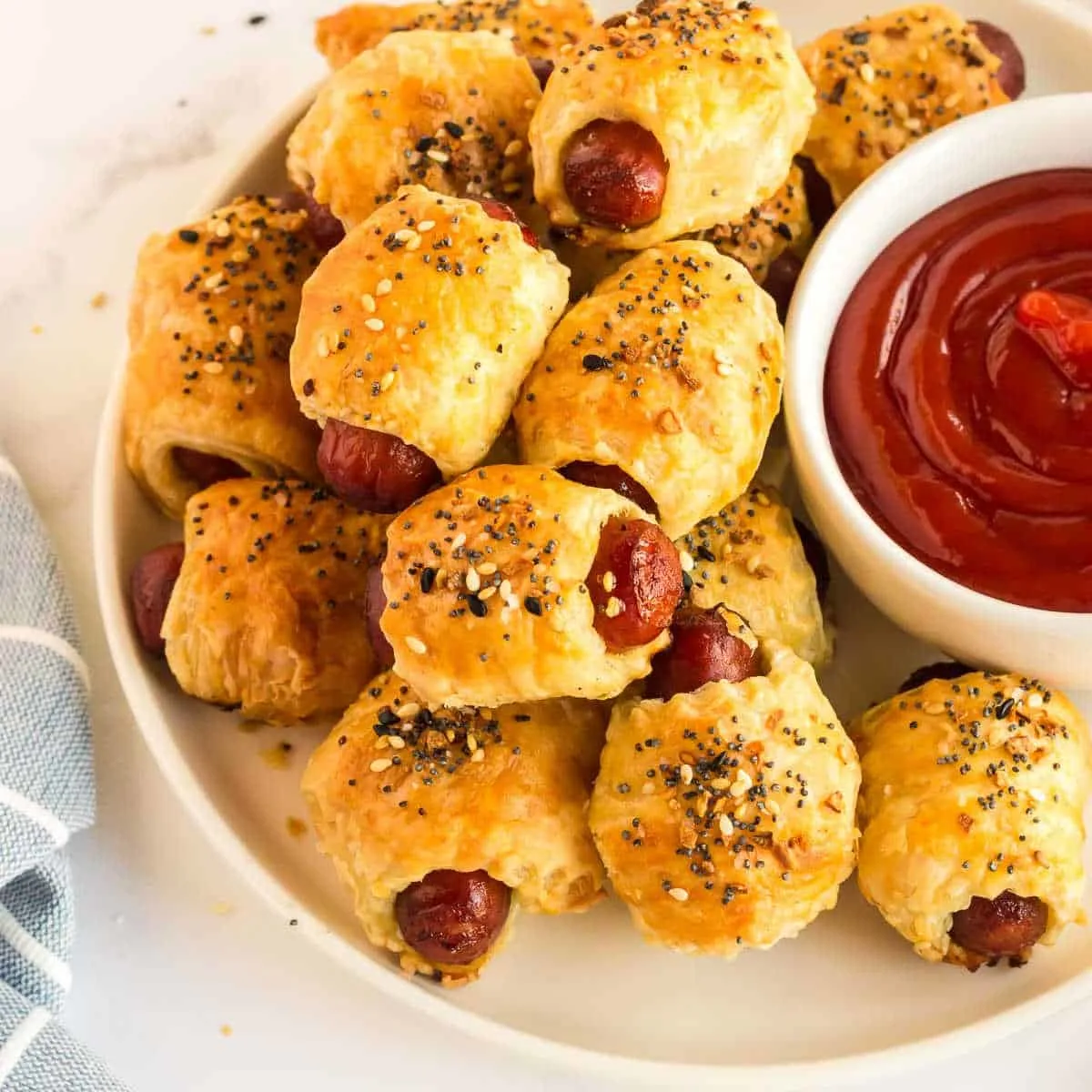 pigs in a blanket on a plate