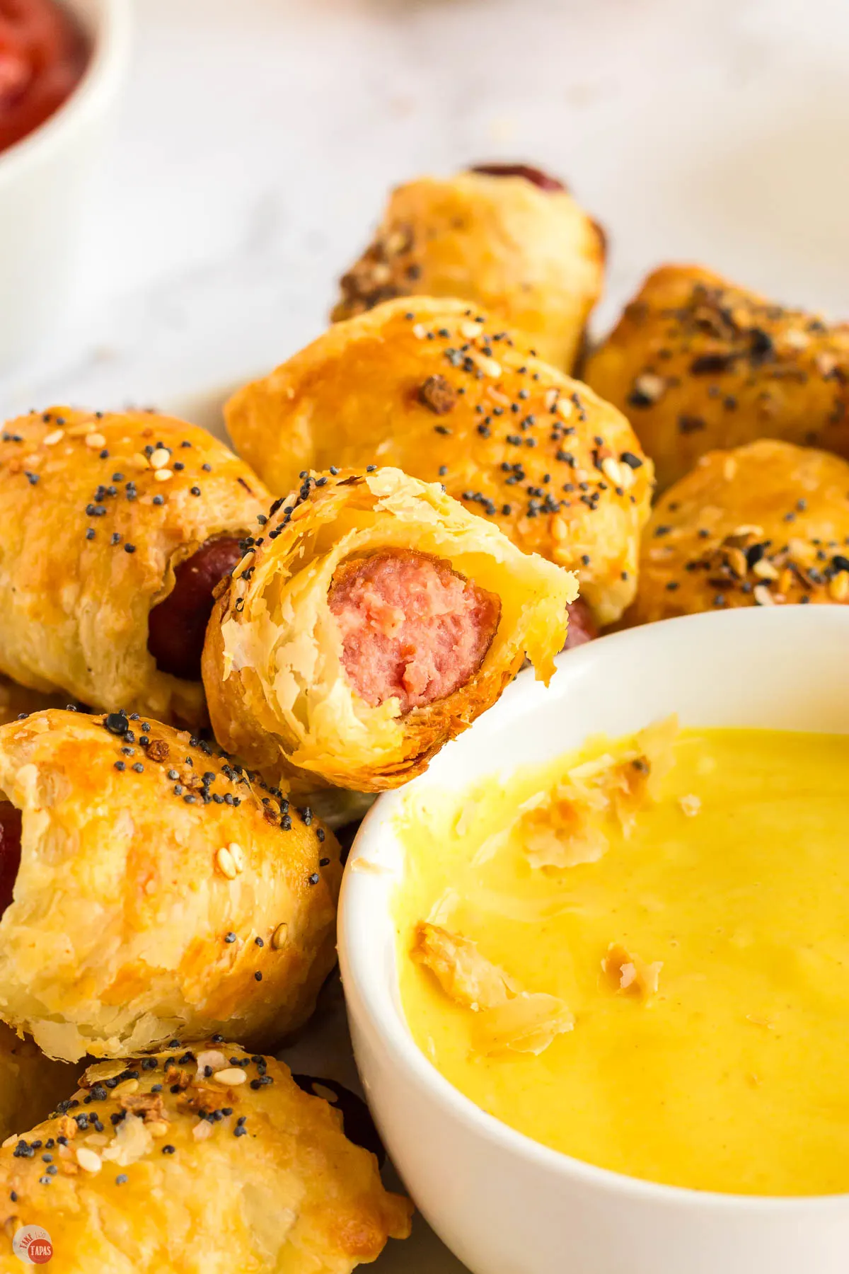mini pigs in a blanket with dipping sauce