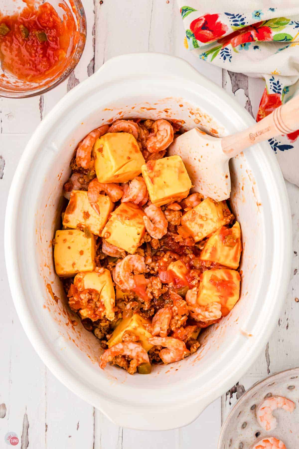 dip ingredients in a slow cooker bowl