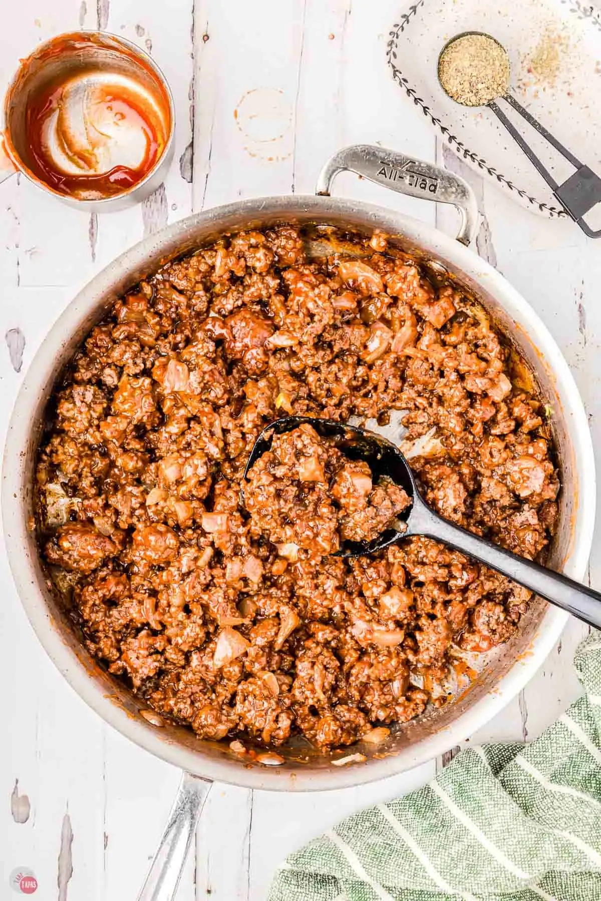 tangy flavor of sloppy joe mixture in a skillet