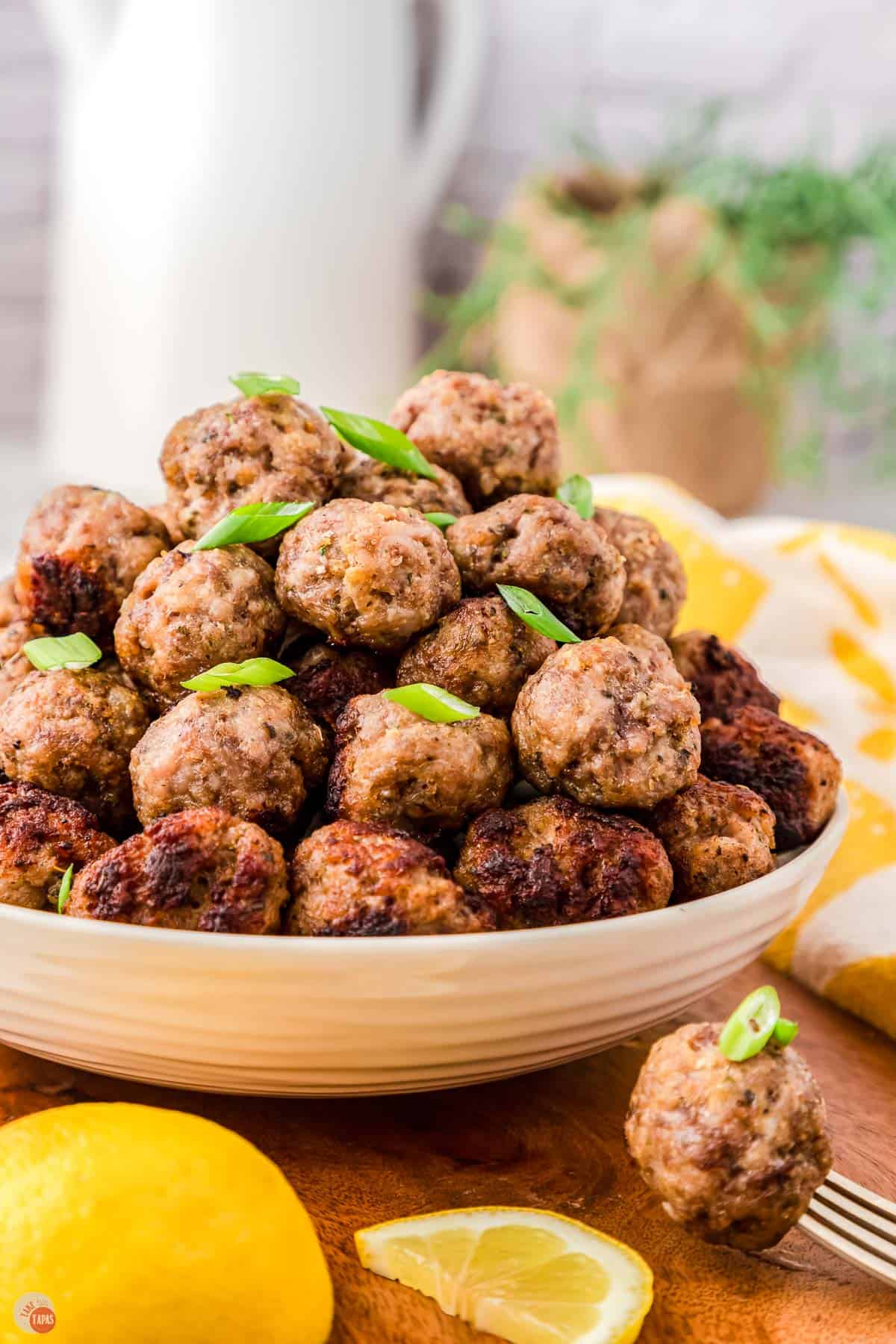 tasty meatballs in a white bowl