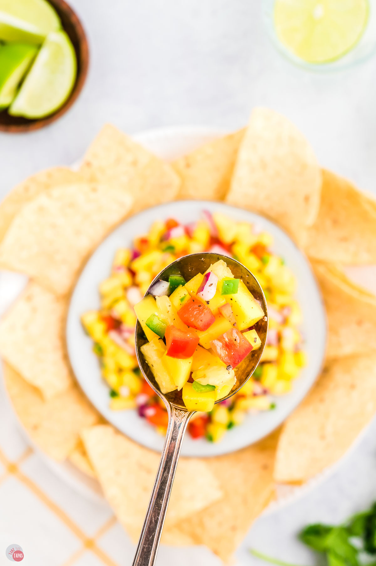 spoon of diced pineapple and pepper