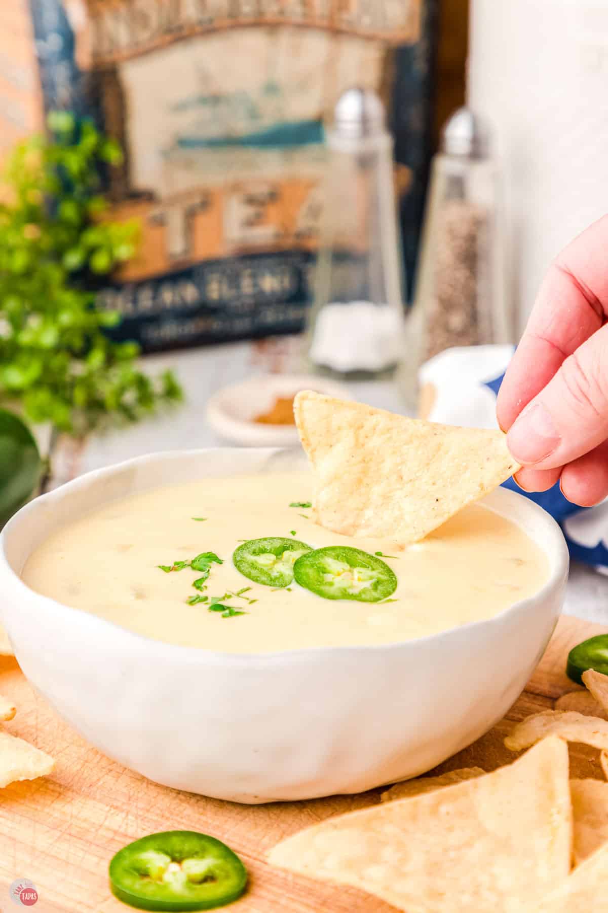 chip dipping into a bowl