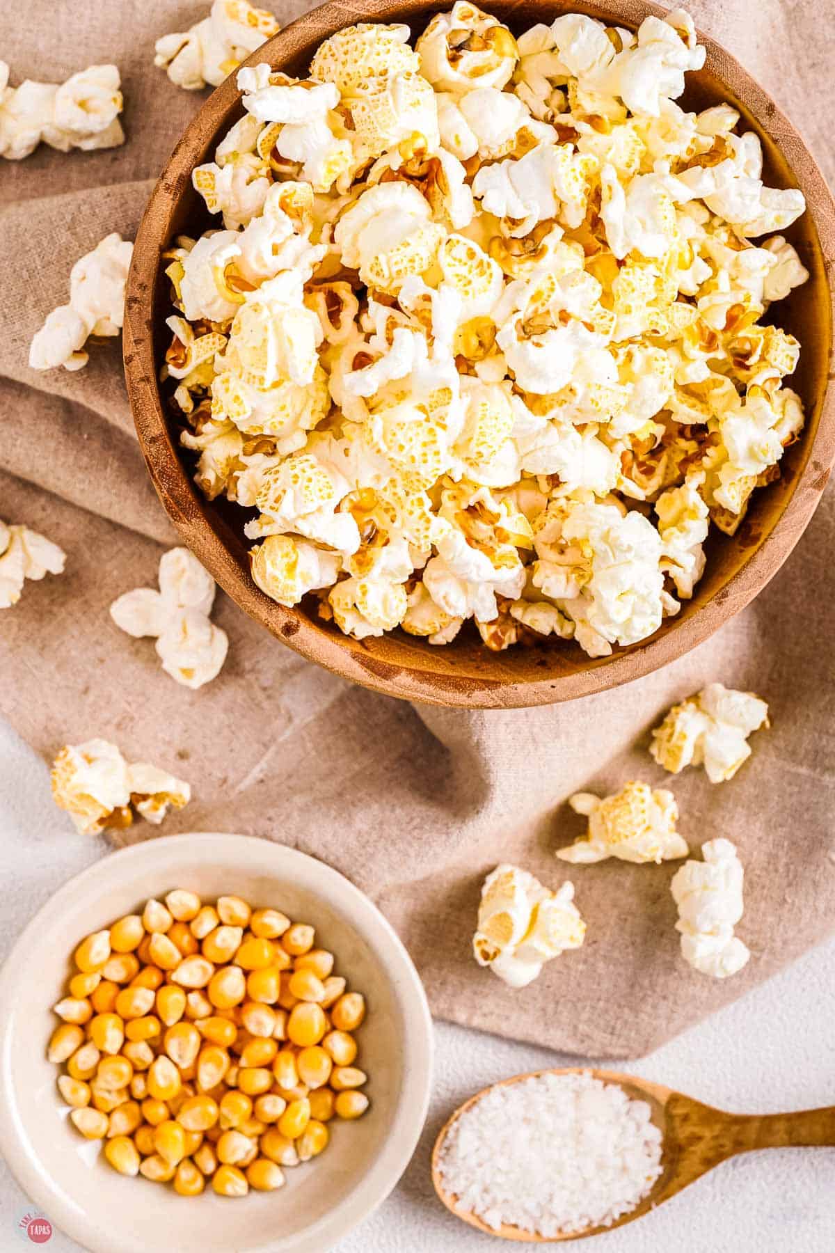 salt and vinegar popcorn in a wood bowl