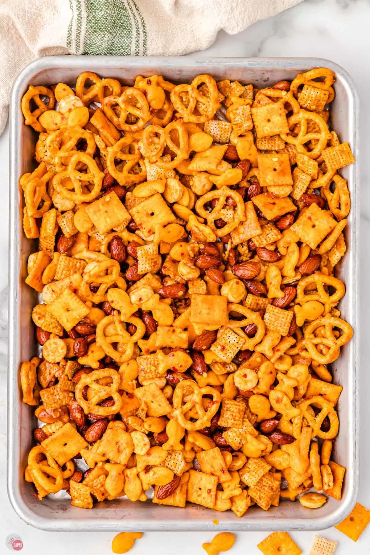 chex mix in an ungreased large roasting pan