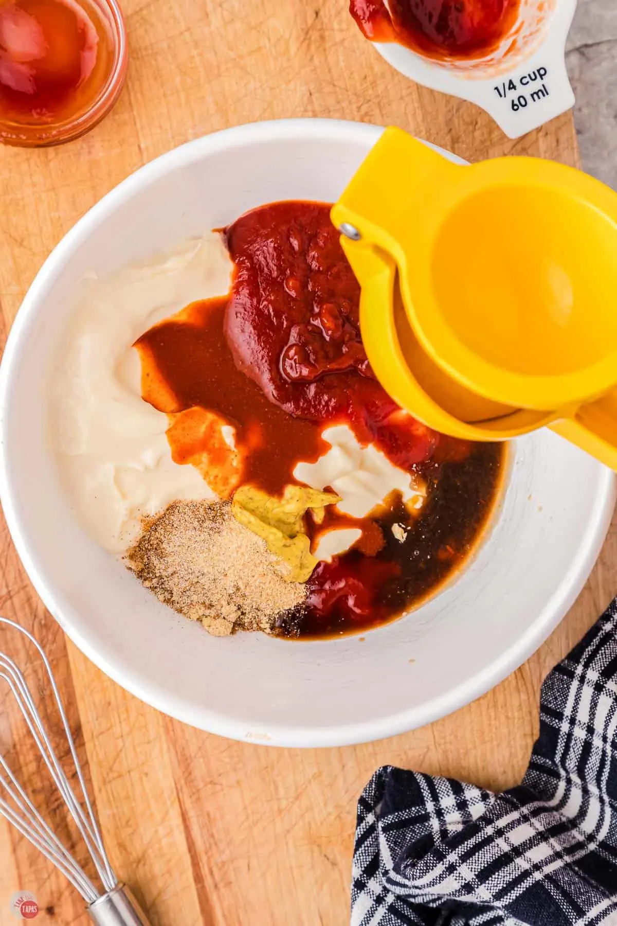 ingredients for a spicy sauce in a white bowl