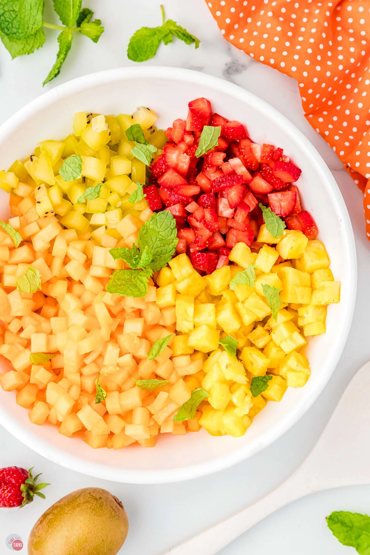 bowl of fresh fruit cut into small pieces