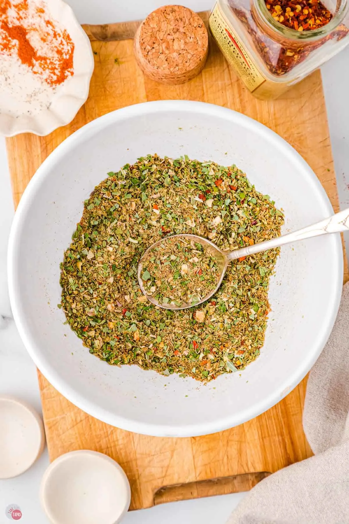 bowl of spice mix with spoon in it