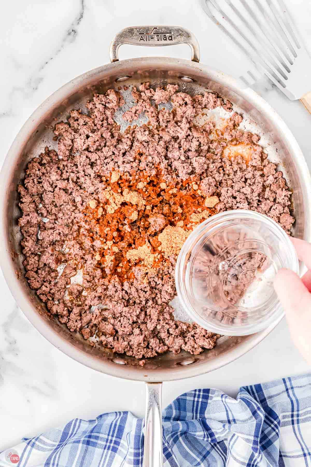 ground beef, taco seasoning, and water in a skillet