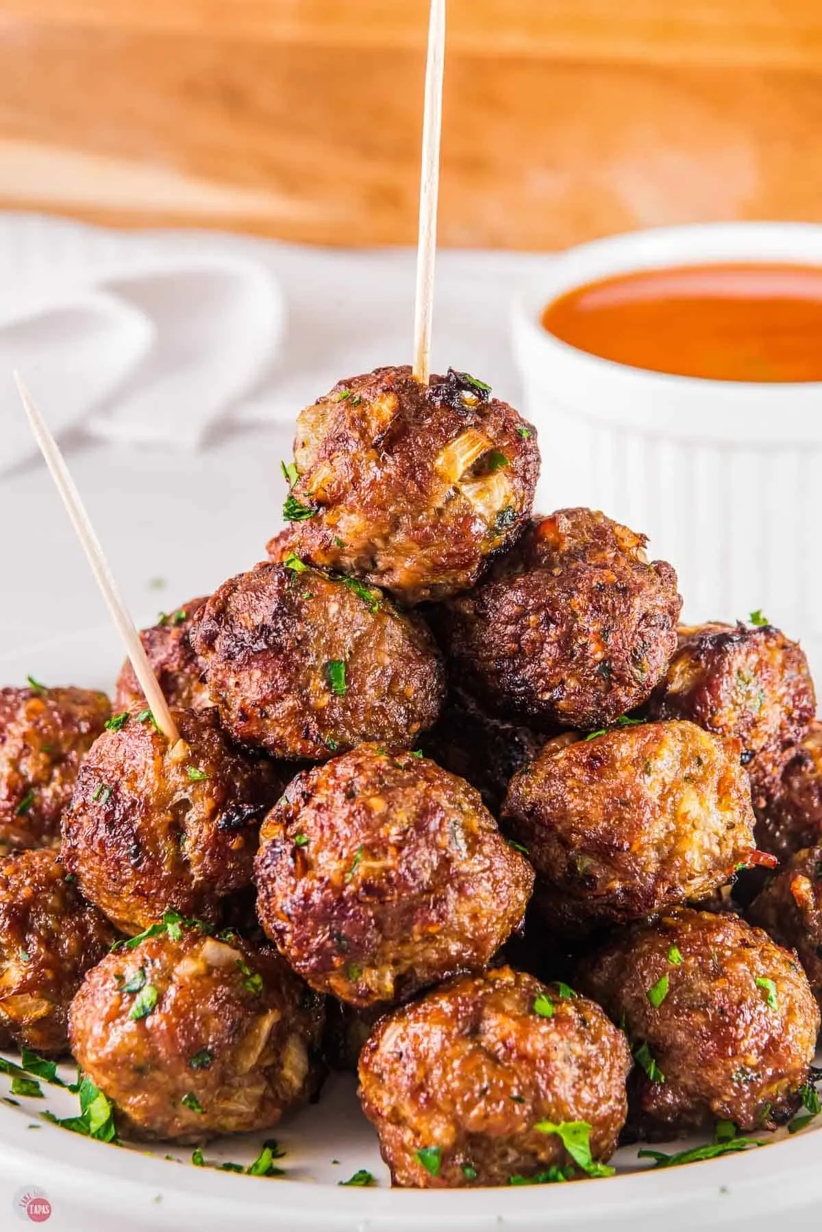 classic italian meatball recipe in a stack with toothpicks