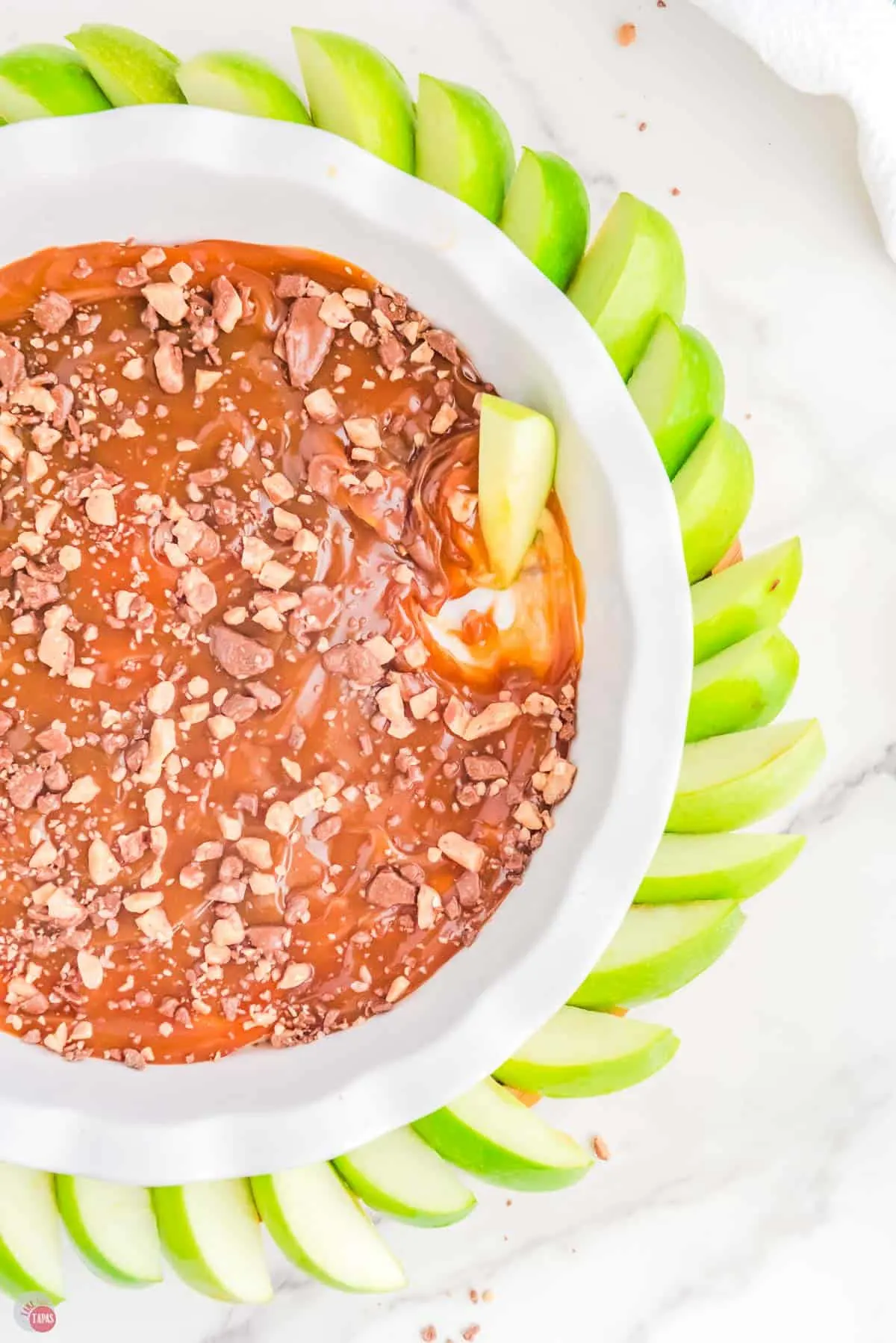delicious caramel apple dip with sliced green apples