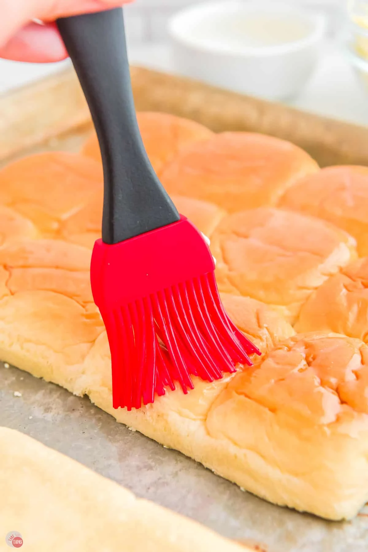 brush buns with melted butter