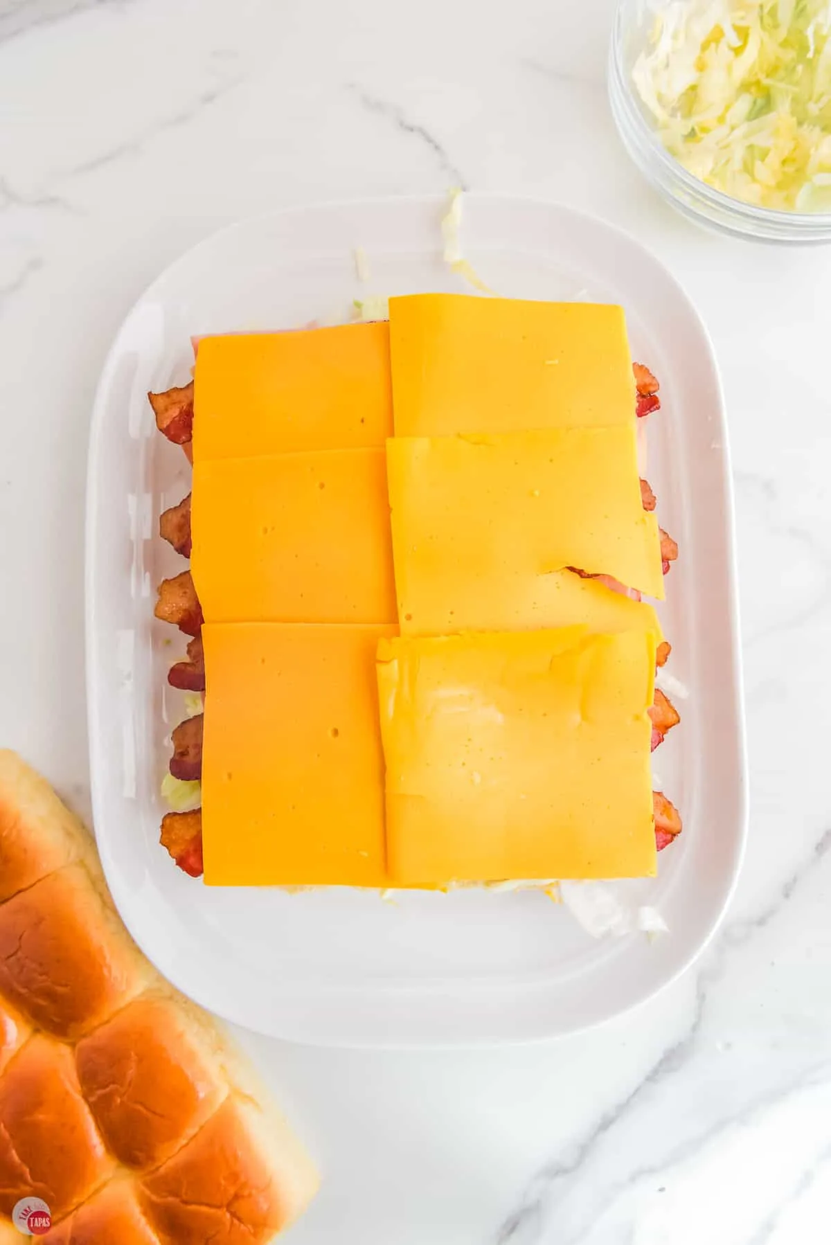 bacon and cheese slices on bread