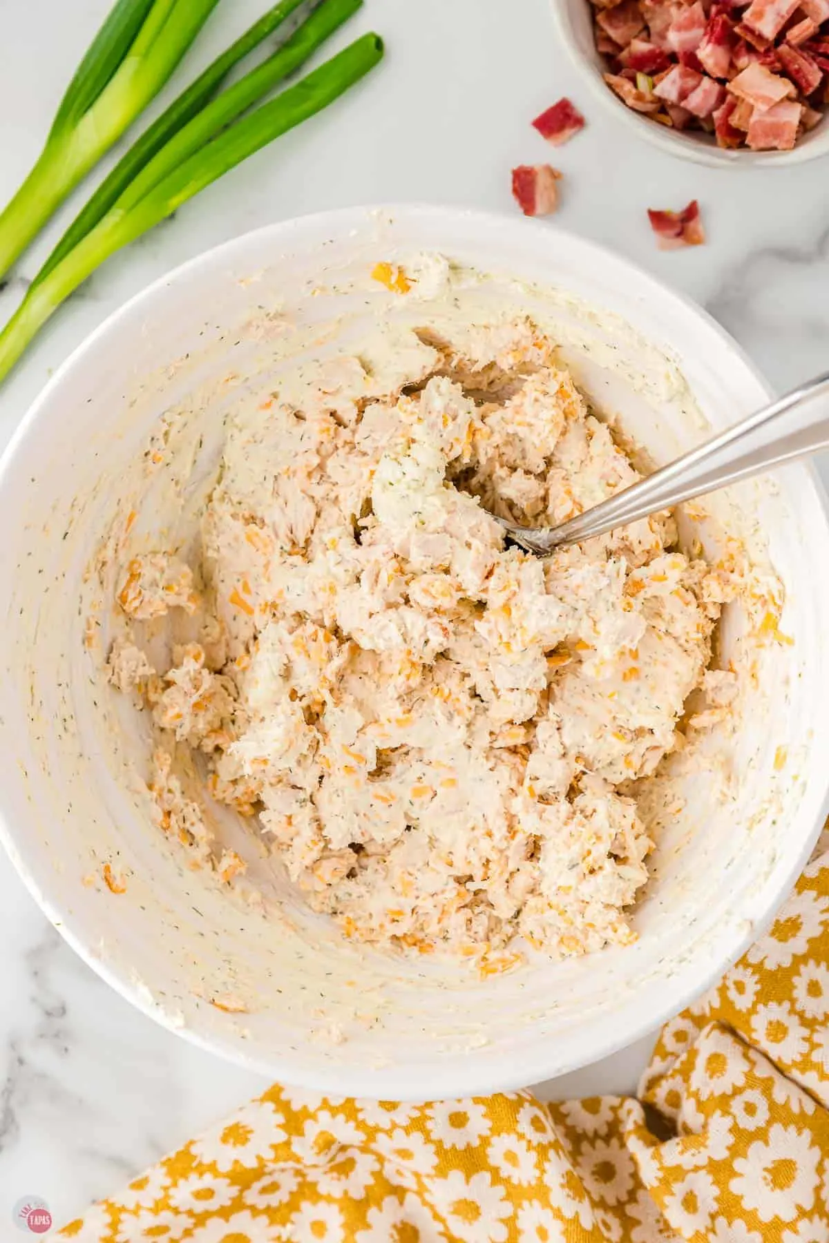 large mixing bowl with cream cheese mixture in it