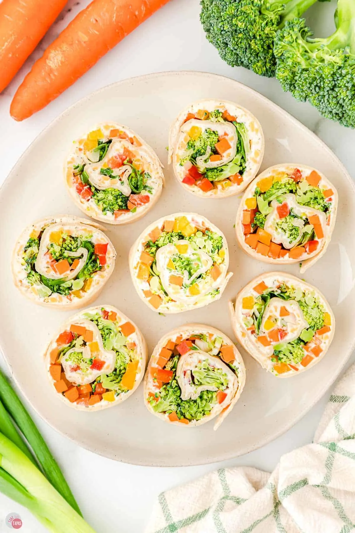 veggie pizza pinwheels on a plate