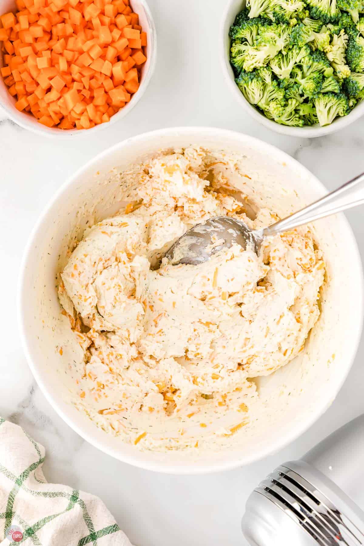 cream cheese mixture with cheese and broccoli