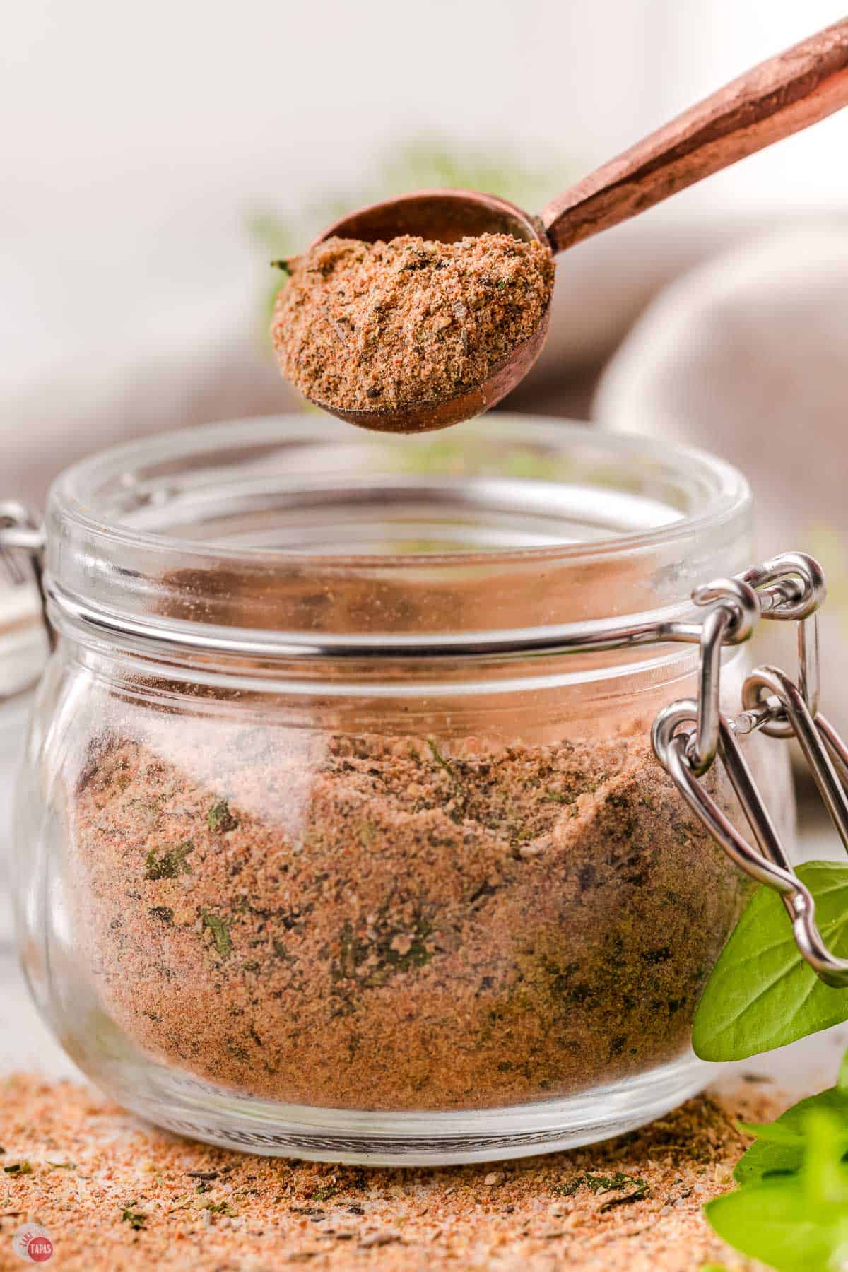 chicken seasoning mix in a measuring spoon