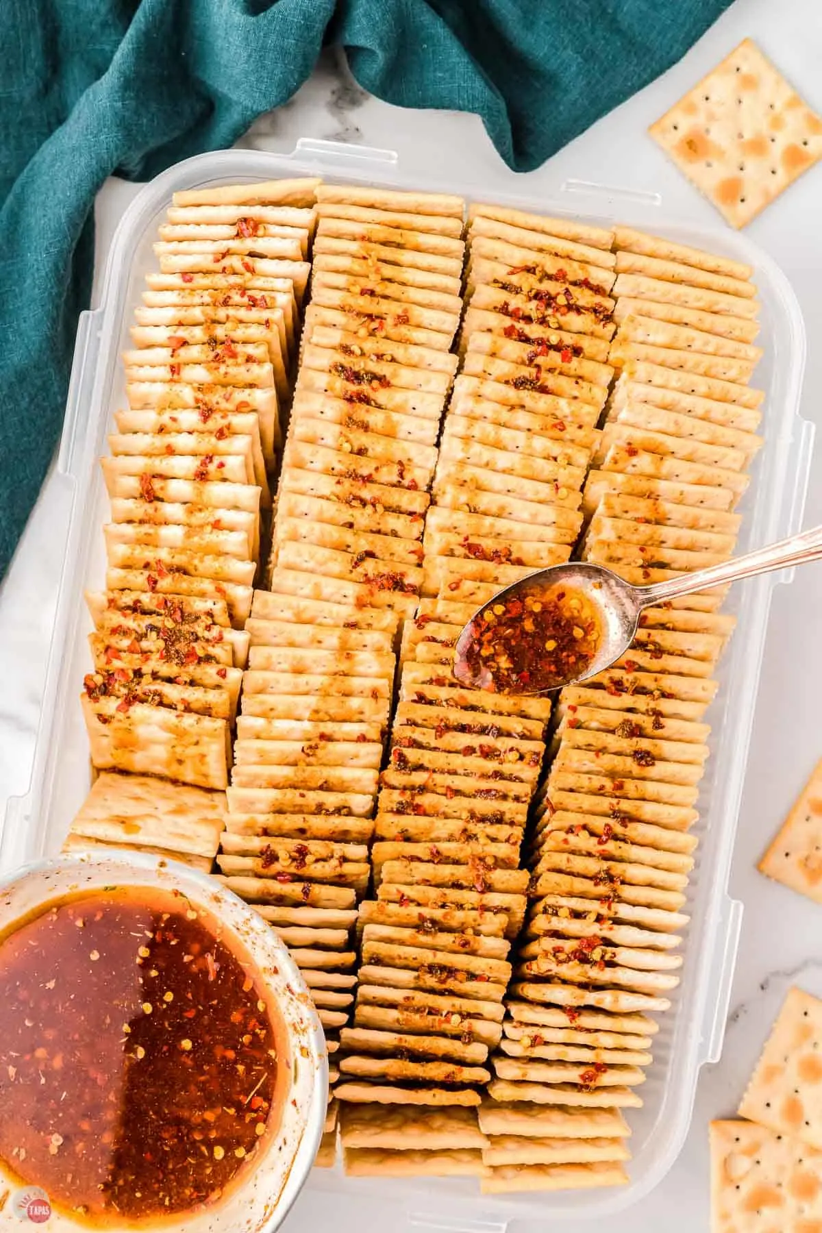 pour oil mixture over crackers