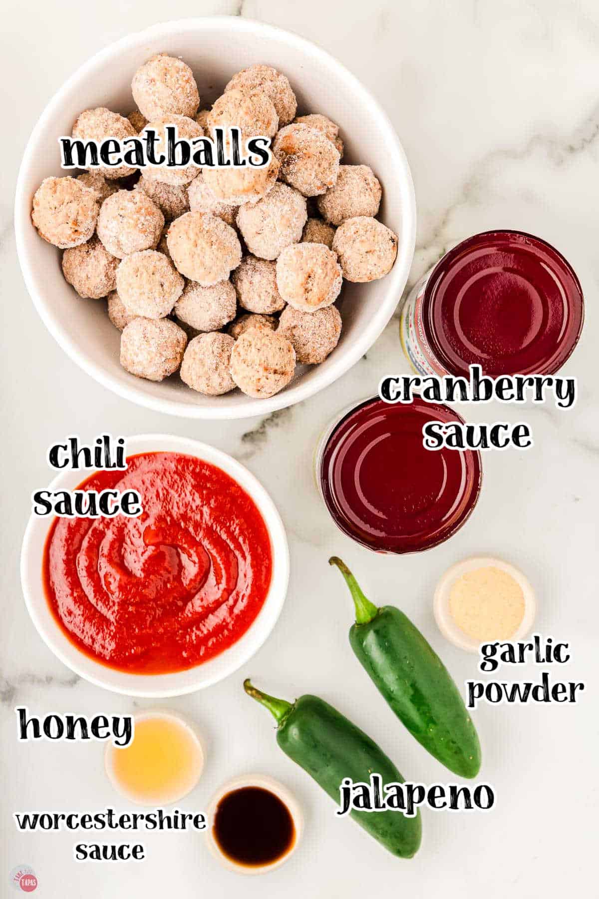 simple ingredients for party meatballs that includes a bowl of chili sauce and can of cranberry sauce.