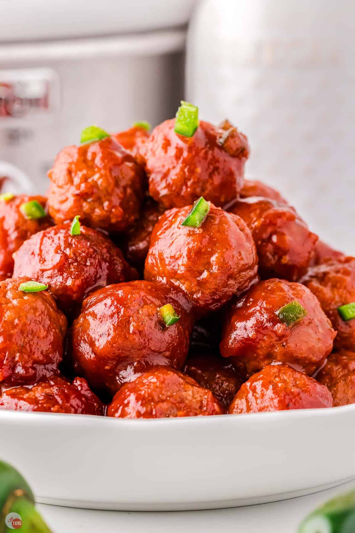 cranberry sauce meatballs with jalapeno on a plate