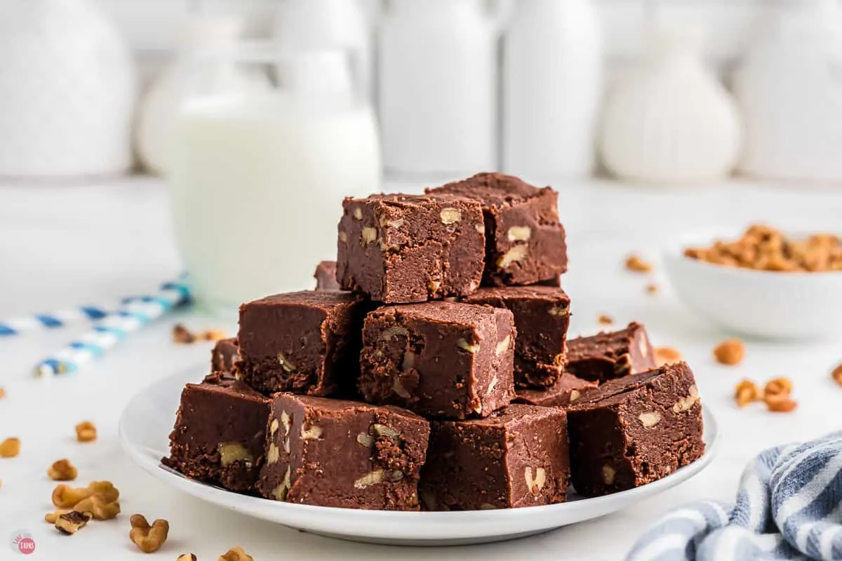 plate of fantasy fudge with a glass of milk