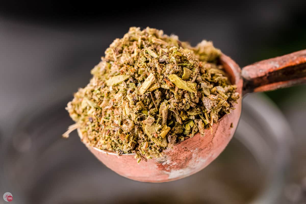 close up of spoon of spices